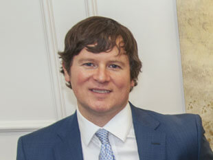 An image of attorney Austin Buerlein in the EO Family Law Office that links to Mr Buerlein  profile.